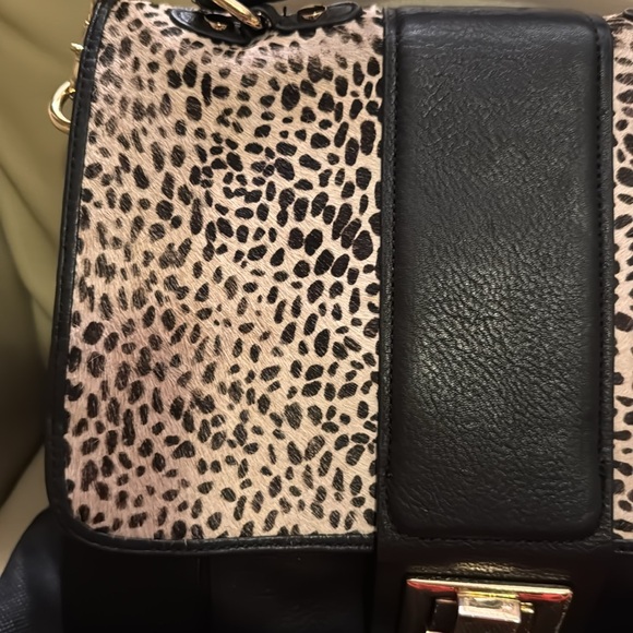 Kelsi Dagger animal print leather purse. - Picture 2 of 9